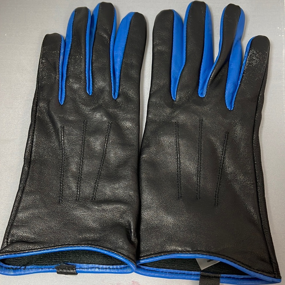 Gently worn Calvin Klein Soft Leather gloves in Black/Blue Small